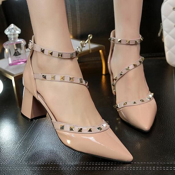 woman sexy pointed toe buckle rivets nude heels