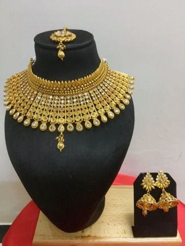 gold plated ethnic indian wedding jewelry set while