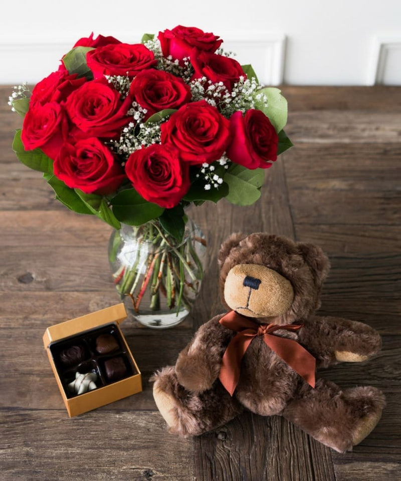 one dozen red roses with godiva chocolate and stuffed teddy bear