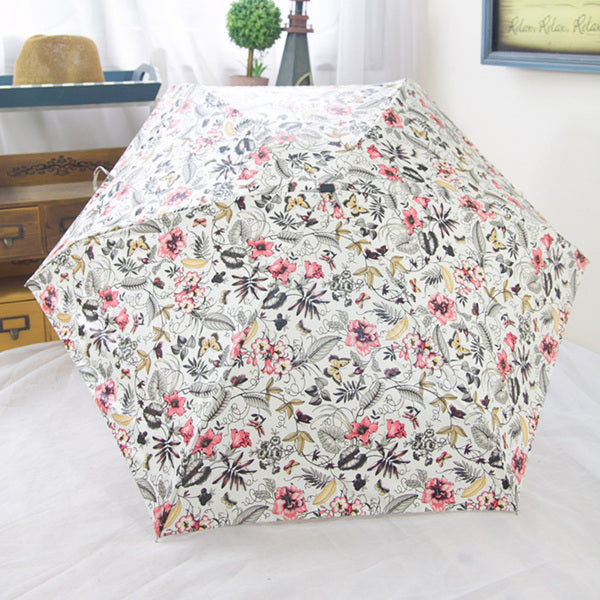 mini pocket umbrella hot sale 190g super light and small foldable umbrellas rain women mini sun parasol kids travel umbrella white flowers